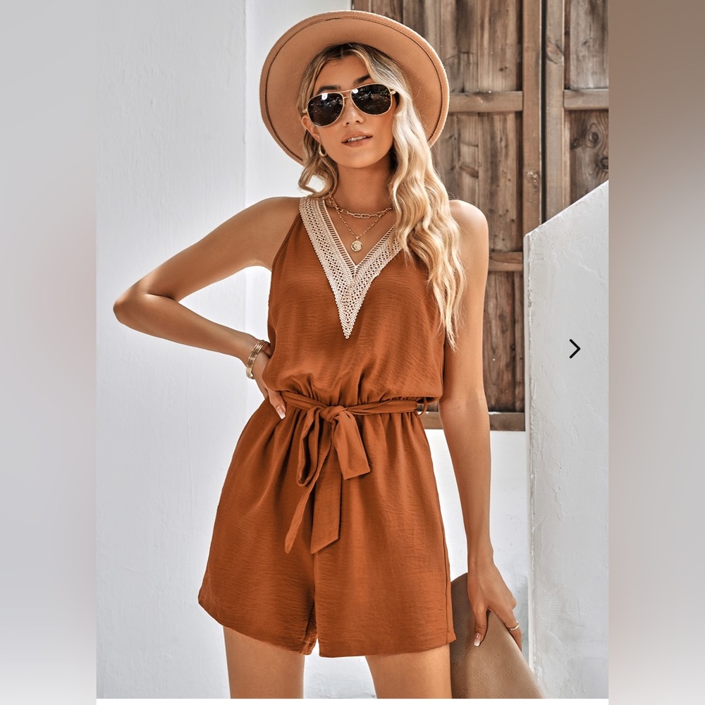 Lace V-Neck sleeveless ruffle hem romper
